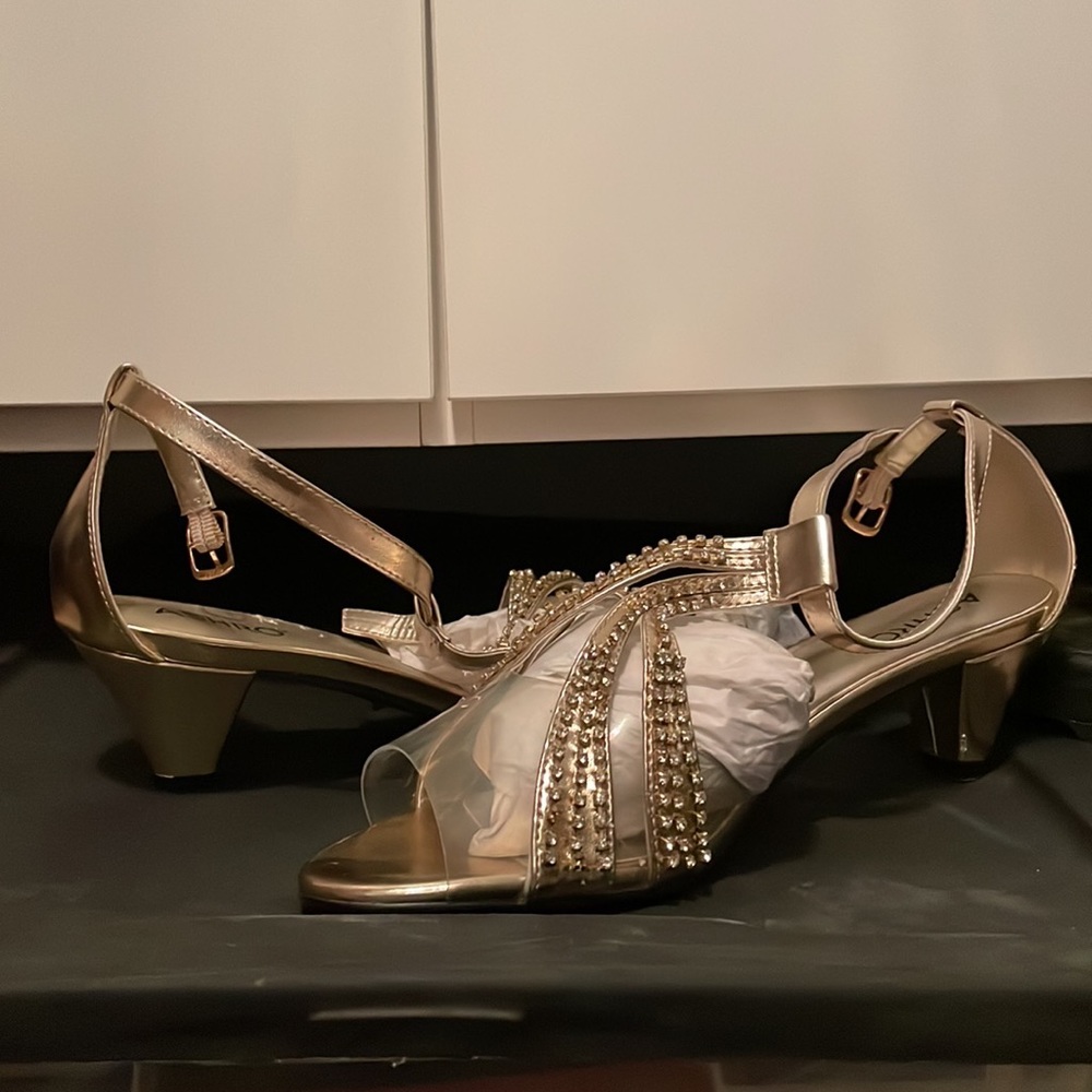 Beautiful new gold and clear Ashro evening shoes with low heel.